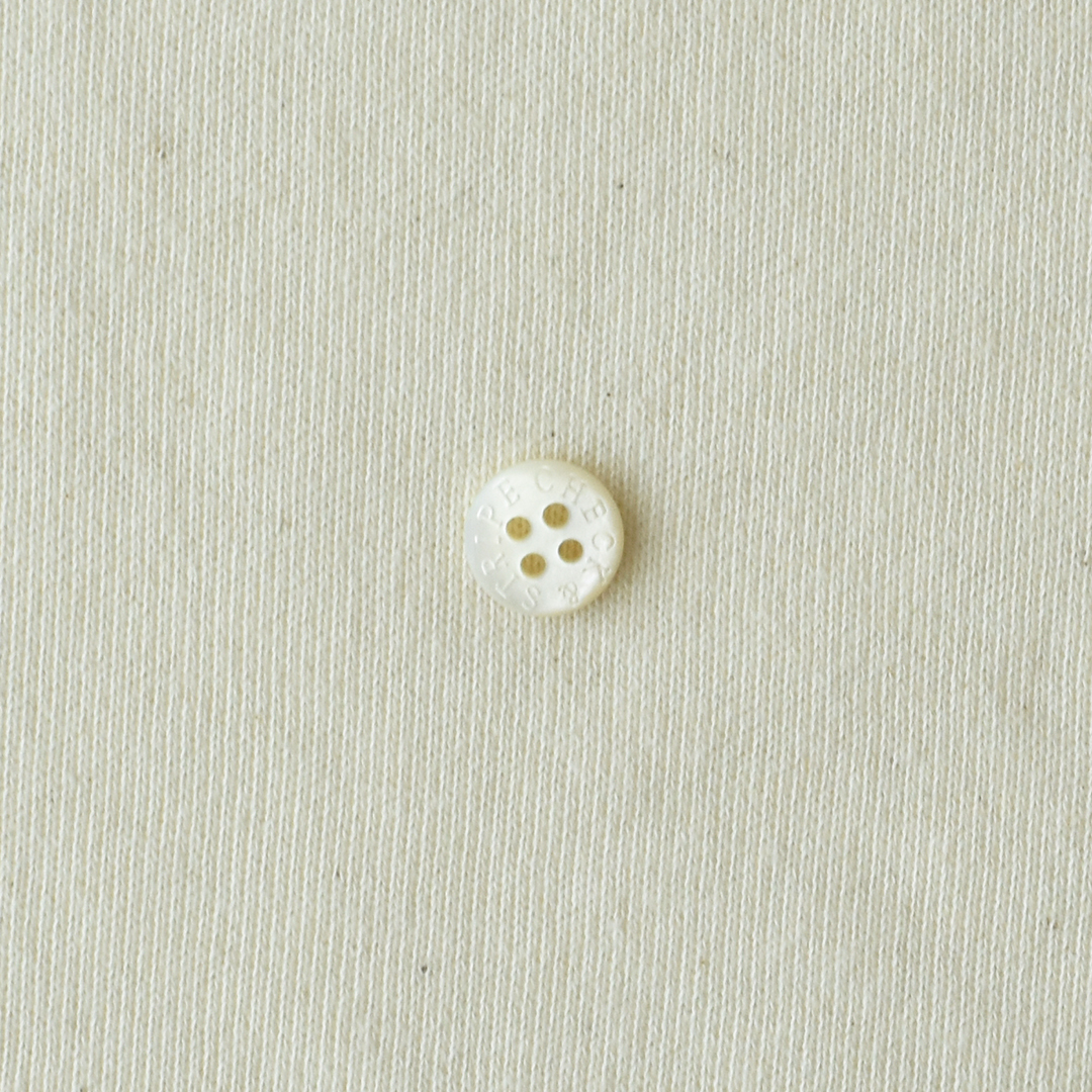 さらっとしたコットンのミニ裏毛ニット　きなり