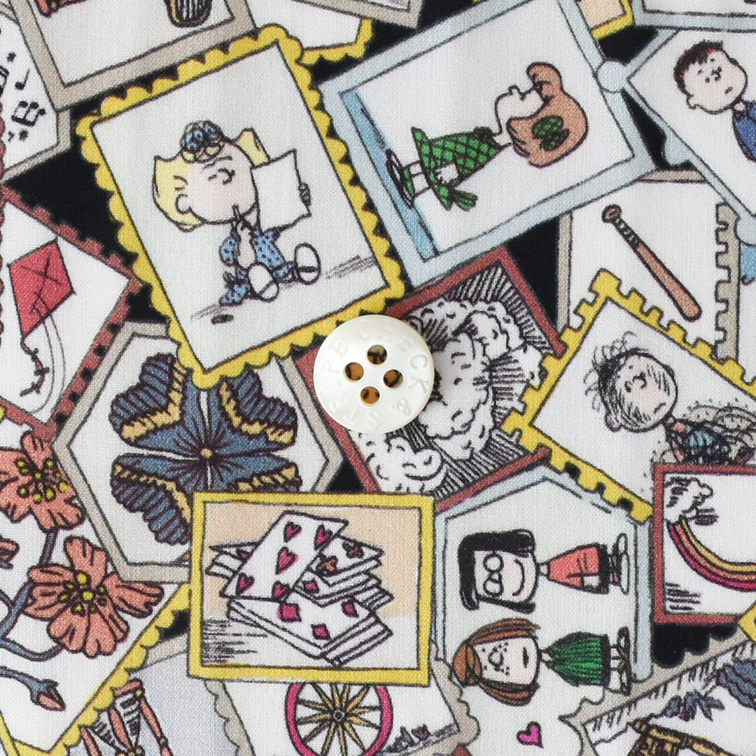 リバティプリント　Stamp Collection J25A(ブラックにイエロー)